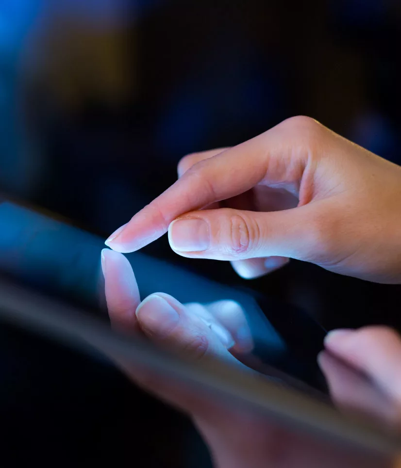 touch_screen Close-up of a person using a digital touchscreen, symbolising IT support and professional IT services from a trusted IT company